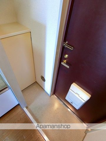 ファーストクラス亀井野の玄関写真
