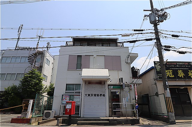 郵便局　大東灰塚郵便局（郵便局）まで511m