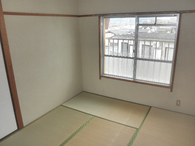 ベルメゾン壱番館の居間写真