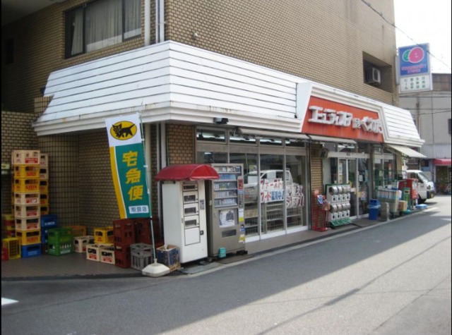 コンビニ　コミュニティ・ストアくわだ店（コンビニ）まで567m