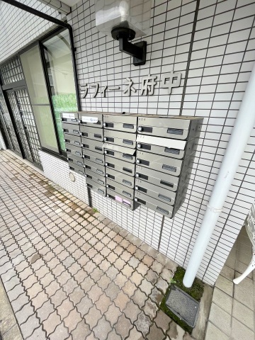 スーパー　万惣府中店（スーパー）まで596m