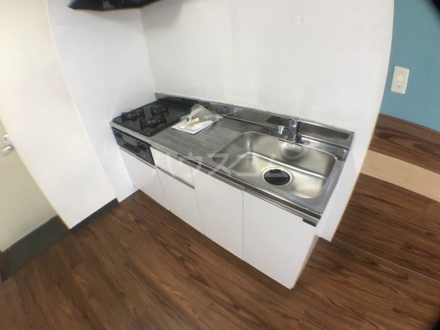 千信レジデンスのキッチン写真