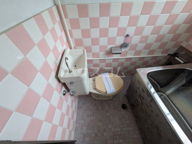 進栄荘のトイレ写真