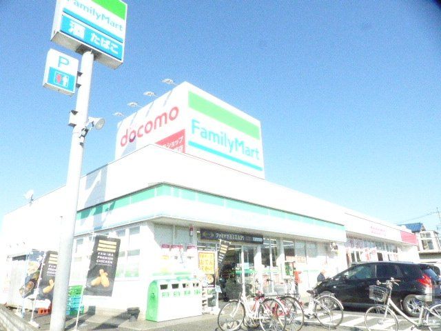 コンビニ　ファミリーマート越谷弥十郎店（コンビニ）まで338m