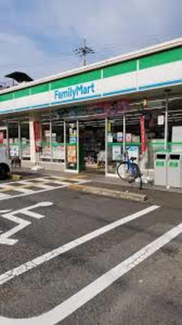 コンビニ　ファミリーマート庄内宝町三丁目店（コンビニ）まで702m