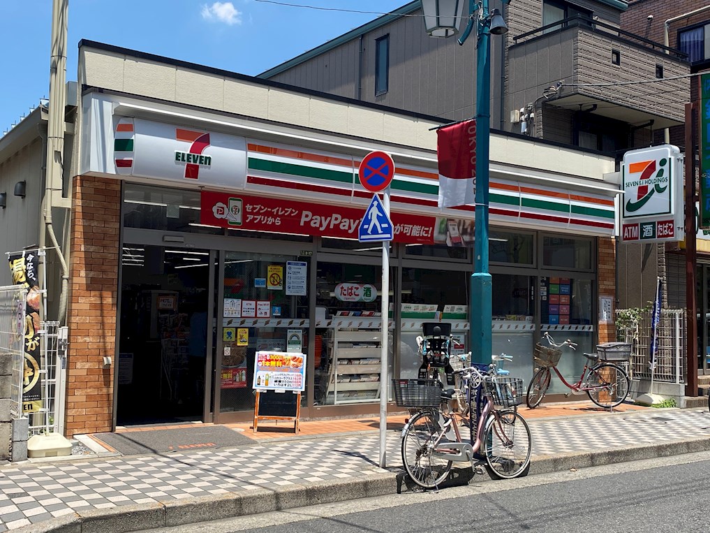 コンビニ　セブンイレブン 足立弘道1丁目店（コンビニ）まで560m