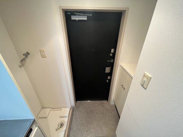 ライジングコート深江本町フラワーパークの玄関写真