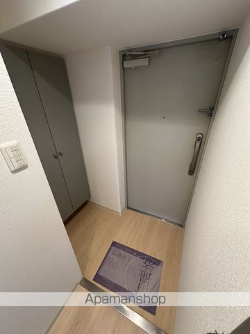地下鉄御堂筋線 中津駅 徒歩3分 15階建 築19年の玄関写真