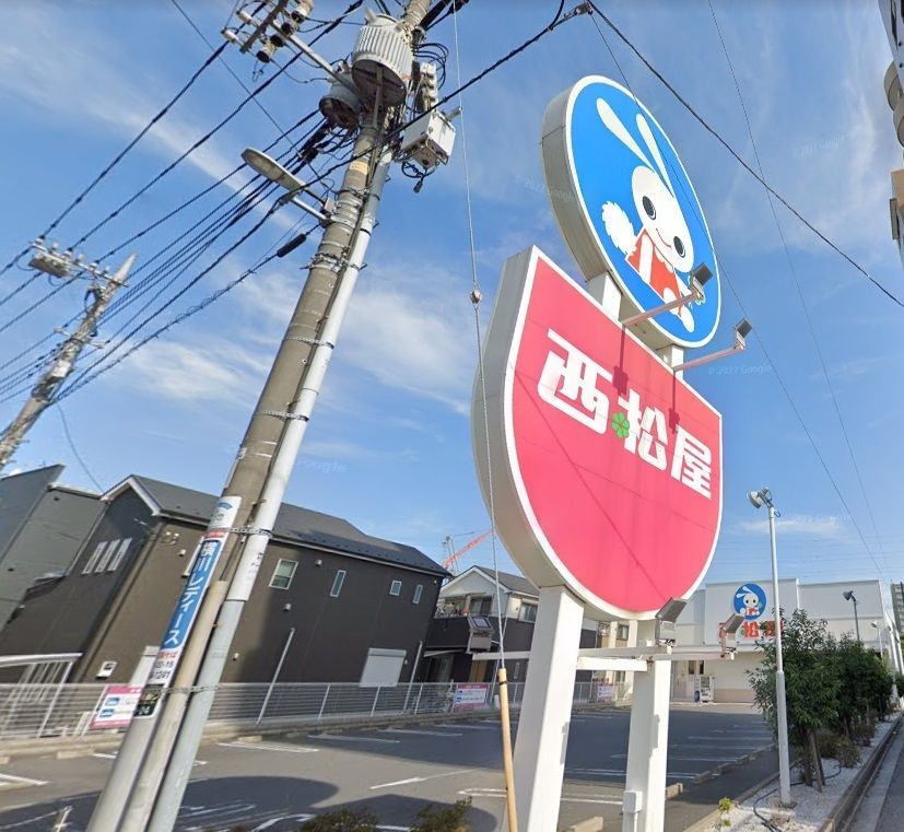 ショッピングセンター　西松屋足立梅島店（ショッピングセンター）まで560m