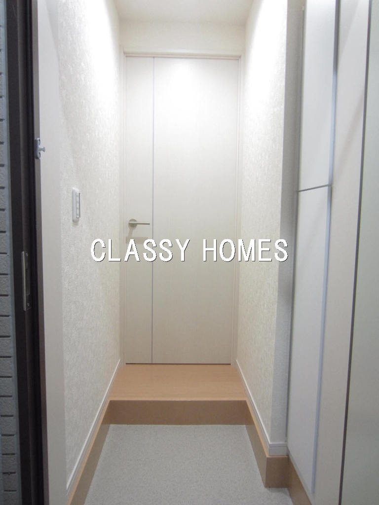 玄関　2016年竣工　ジェムストーン南品川：玄関