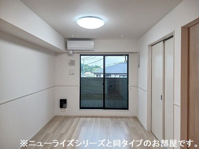 北斗ハイツII・Nの居間写真