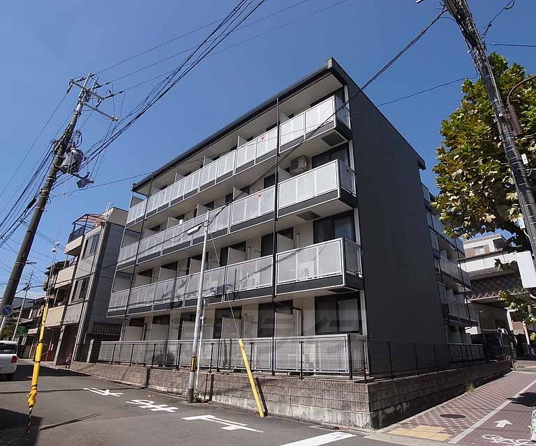 【京都市中京区西ノ京南円町のマンションの建物外観】