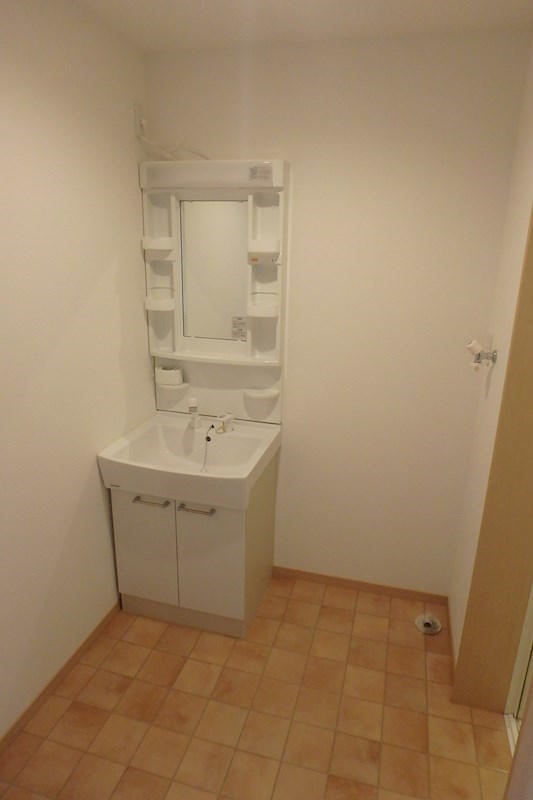 洗面設備　※同間取り306号室参考写真