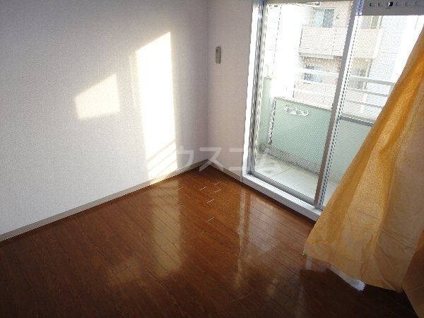 プロクシィスクエア藤見ヶ丘の居間写真