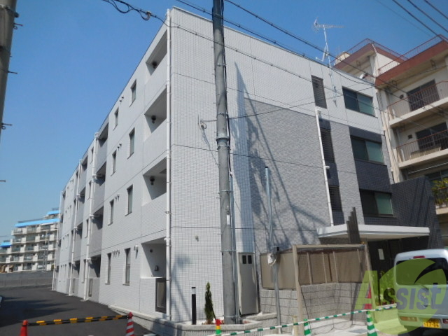 建物外観　タイル張りでずっしりマンションです