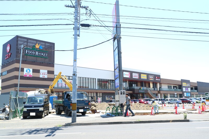 スーパー　ニシナフードバスケット　市役所北店（スーパー）まで575m