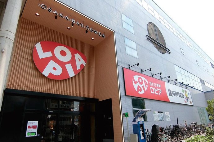 コンビニ　ファミリーマート 大阪ベイタワー店（コンビニ）まで606m