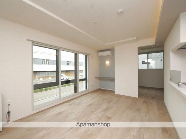札幌市電 西線６条駅 徒歩1分 4階建 築1年の居間写真
