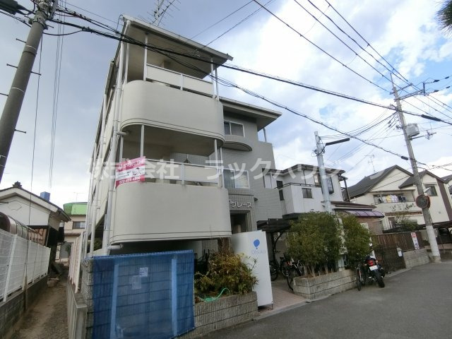 寝屋川市中木田町のマンションの建物外観