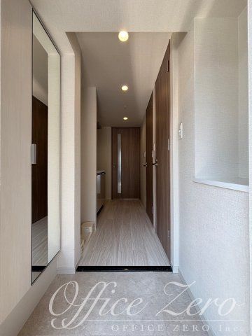 玄関　１Kタイプの写真となります。
