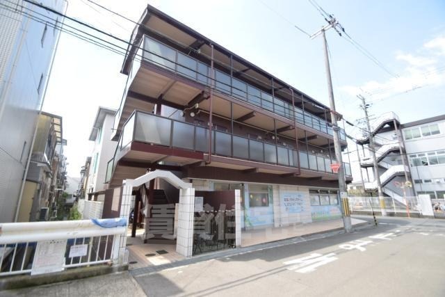 【茨木市西田中町のマンションの建物外観】