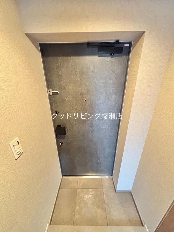 アルコバレーノ北綾瀬の玄関写真