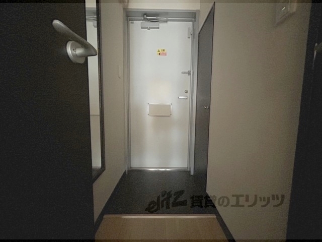 レオネクストみやこ385の玄関写真