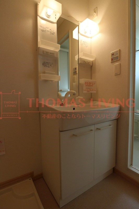 洗面設備　写真は同型物件です。