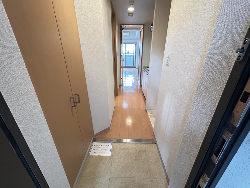 地下鉄御堂筋線 新大阪駅 徒歩7分 15階建 築19年の玄関写真