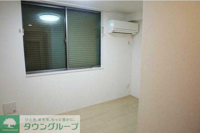 タックフォレスト四ツ木の居間写真