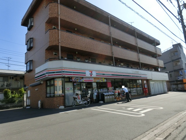 コンビニ　セブンイレブン日野三沢店（コンビニ）まで126m