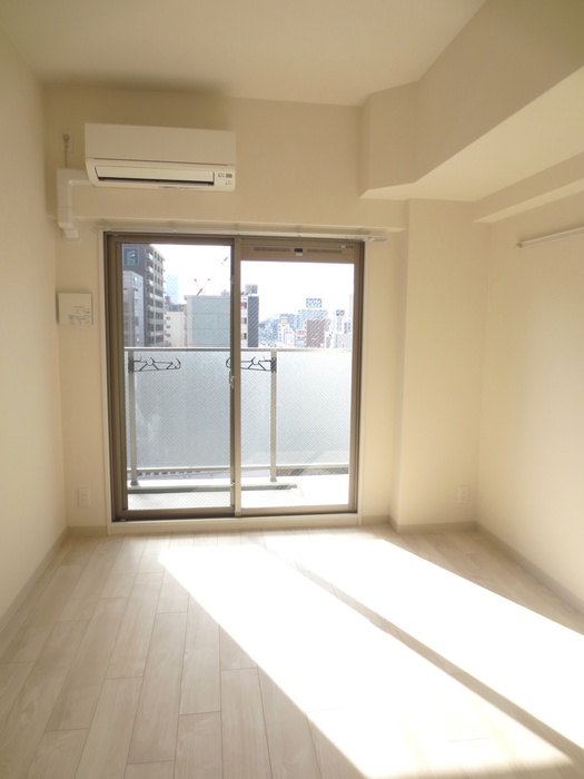 プレサンス松屋町駅前の居間写真
