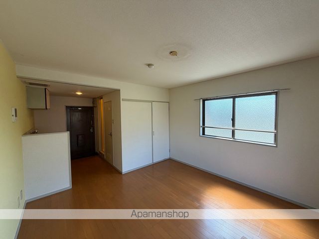 シャンポール南郡元の居間写真