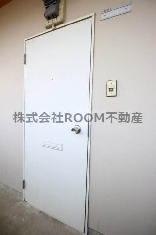 メイプルコート一万城の玄関写真