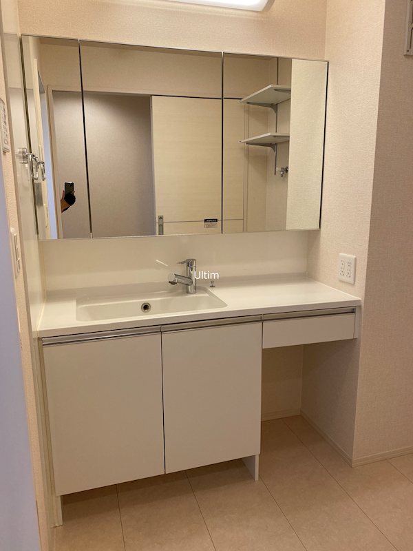 洗面設備　※別の部屋の写真です