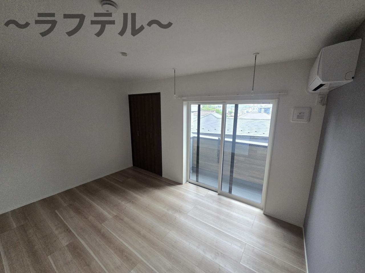 MELLAS新狭山IIIの居間写真
