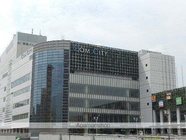 ショッピングセンター　コムシティ（ショッピングセンター）まで590m
