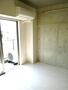 居室・リビング　内装の壁はコンクリート打ちっぱなしのお部屋です