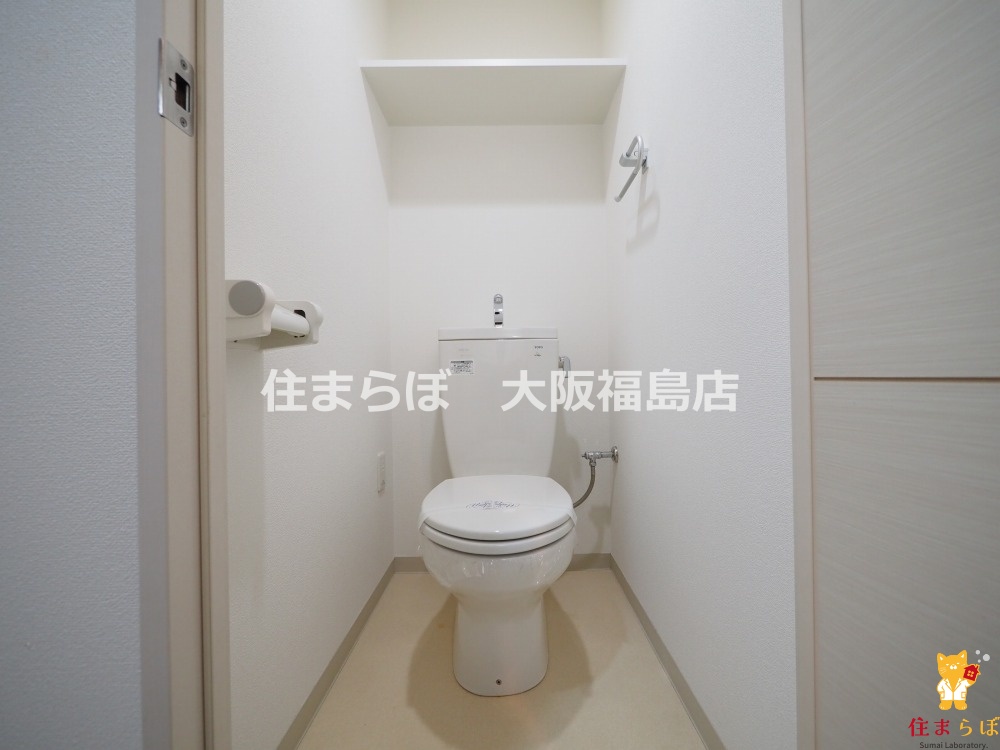 地下鉄長堀鶴見緑地線 長堀橋駅 徒歩3分 15階建 築16年のトイレ写真