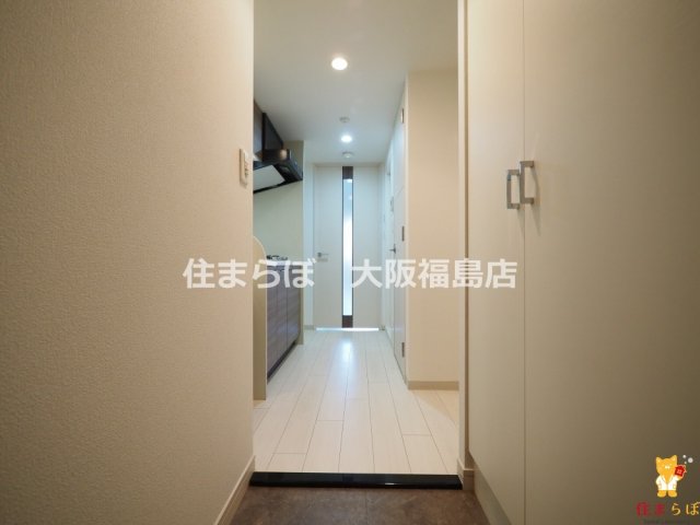 地下鉄長堀鶴見緑地線 長堀橋駅 徒歩3分 15階建 築16年の玄関写真