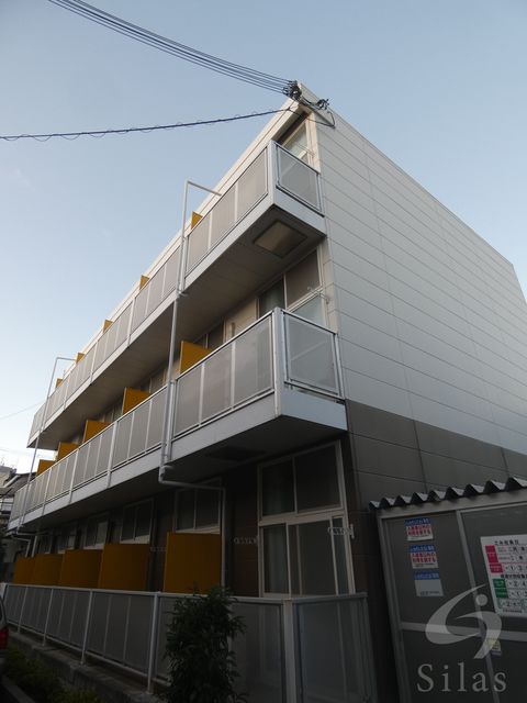 【摂津市千里丘のマンションの建物外観】