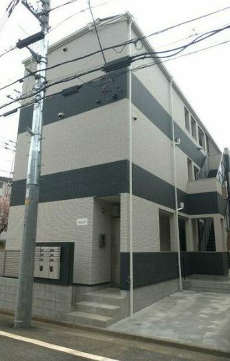 【多摩市唐木田のアパートの建物外観】