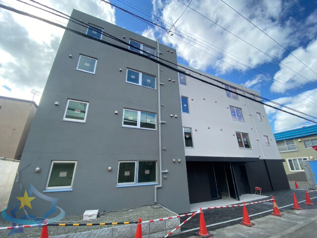 【札幌市豊平区月寒東一条のマンションの建物外観】