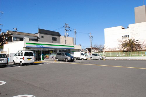 コンビニ　ファミリーマート西成松店（コンビニ）まで439m