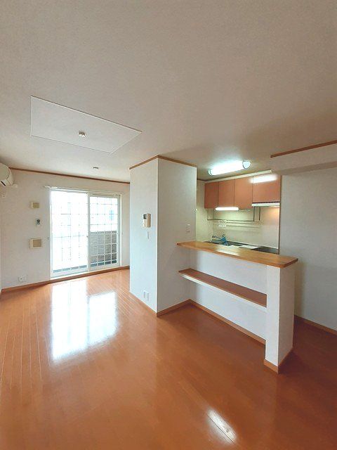 アメニティーハイツ川島IIの居間写真