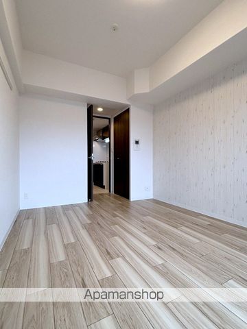 地下鉄長堀鶴見緑地線 玉造駅 徒歩3分 14階建 築8年の居間写真