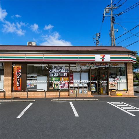 コンビニ　セブン－イレブン越谷千間台東店（コンビニ）まで875m