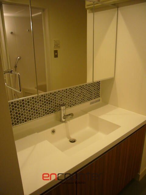 洗面設備　※同マンション別室参考写真