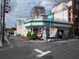 コンビニ　ファミリーマート 田口屋西新井大師店（コンビニ）まで726m