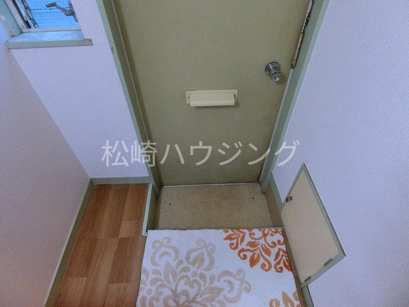 ホワイト松が丘の玄関写真